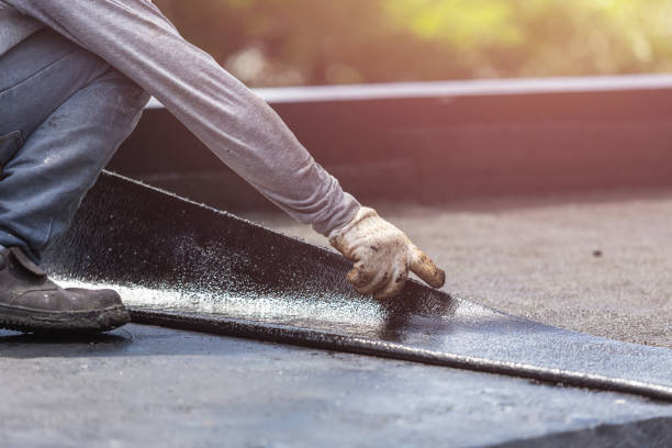 Professional Exterior Waterproofing technician working in Bath, NY